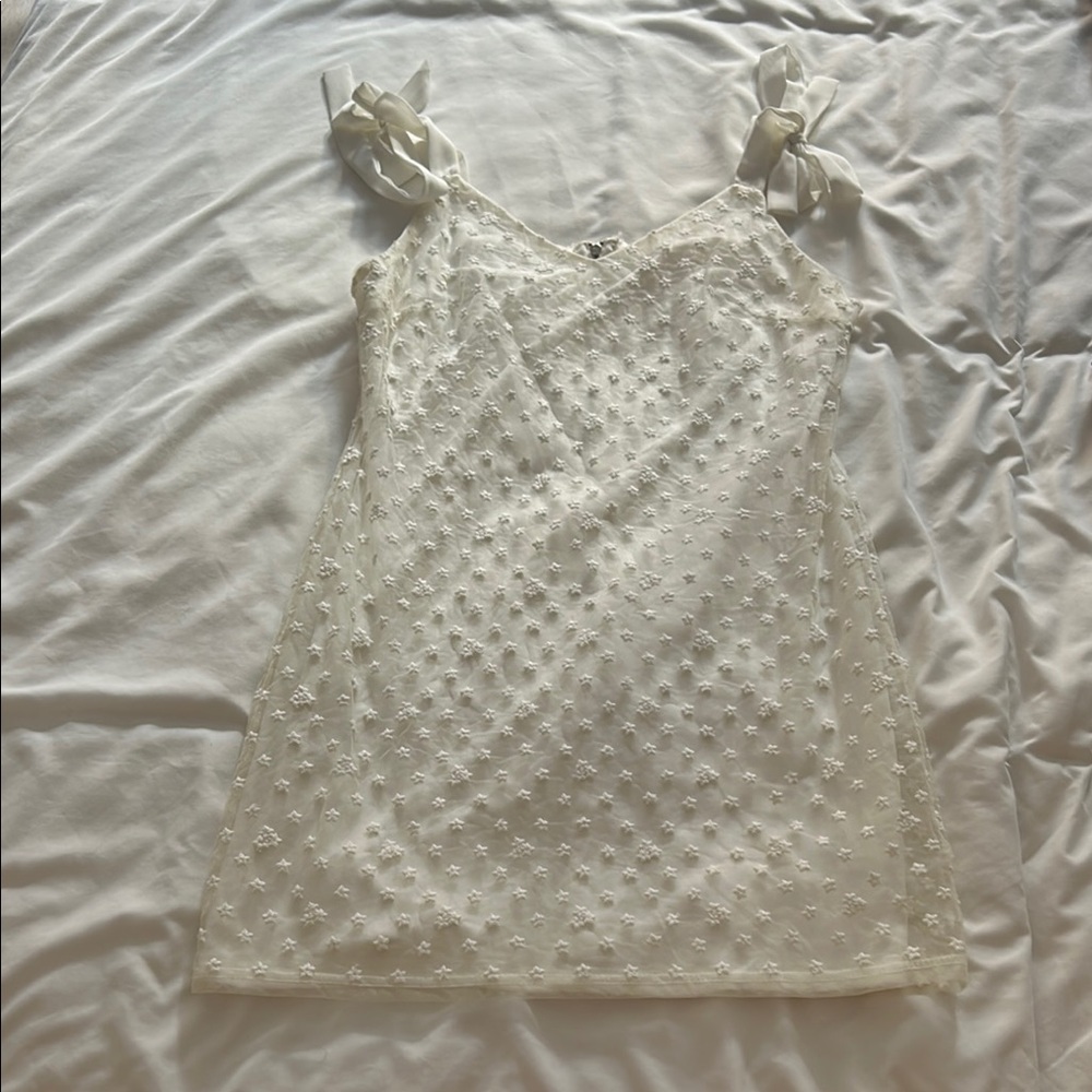 Elegant Cream Sleeveless Mini Dress